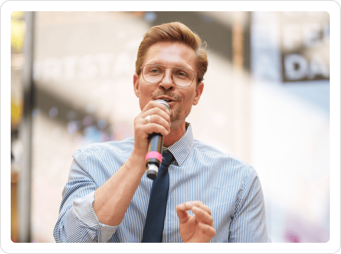 Avon Kettner, professional emcee, hosting an event